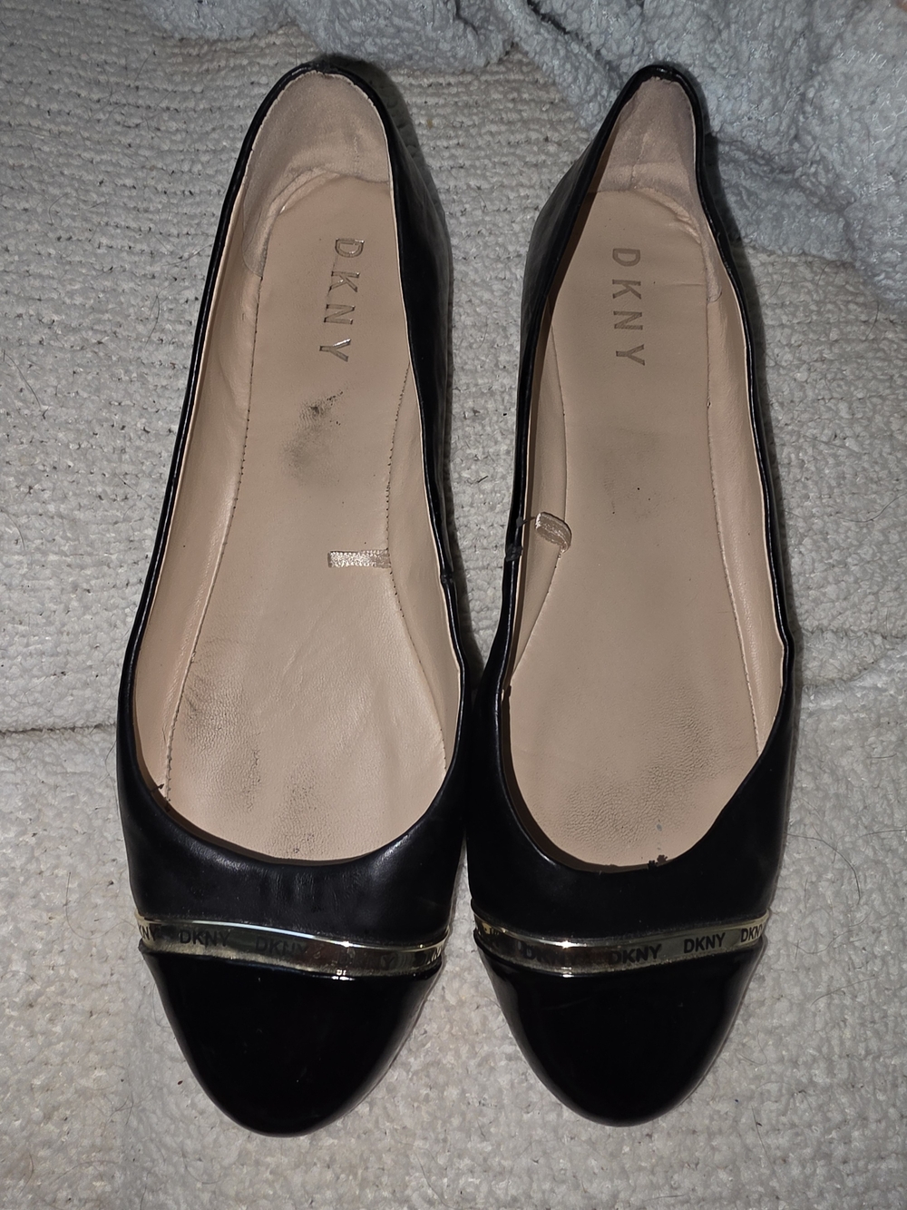 DKNY Women’s Signature Black Leather Ballet Flats with Gold Trim